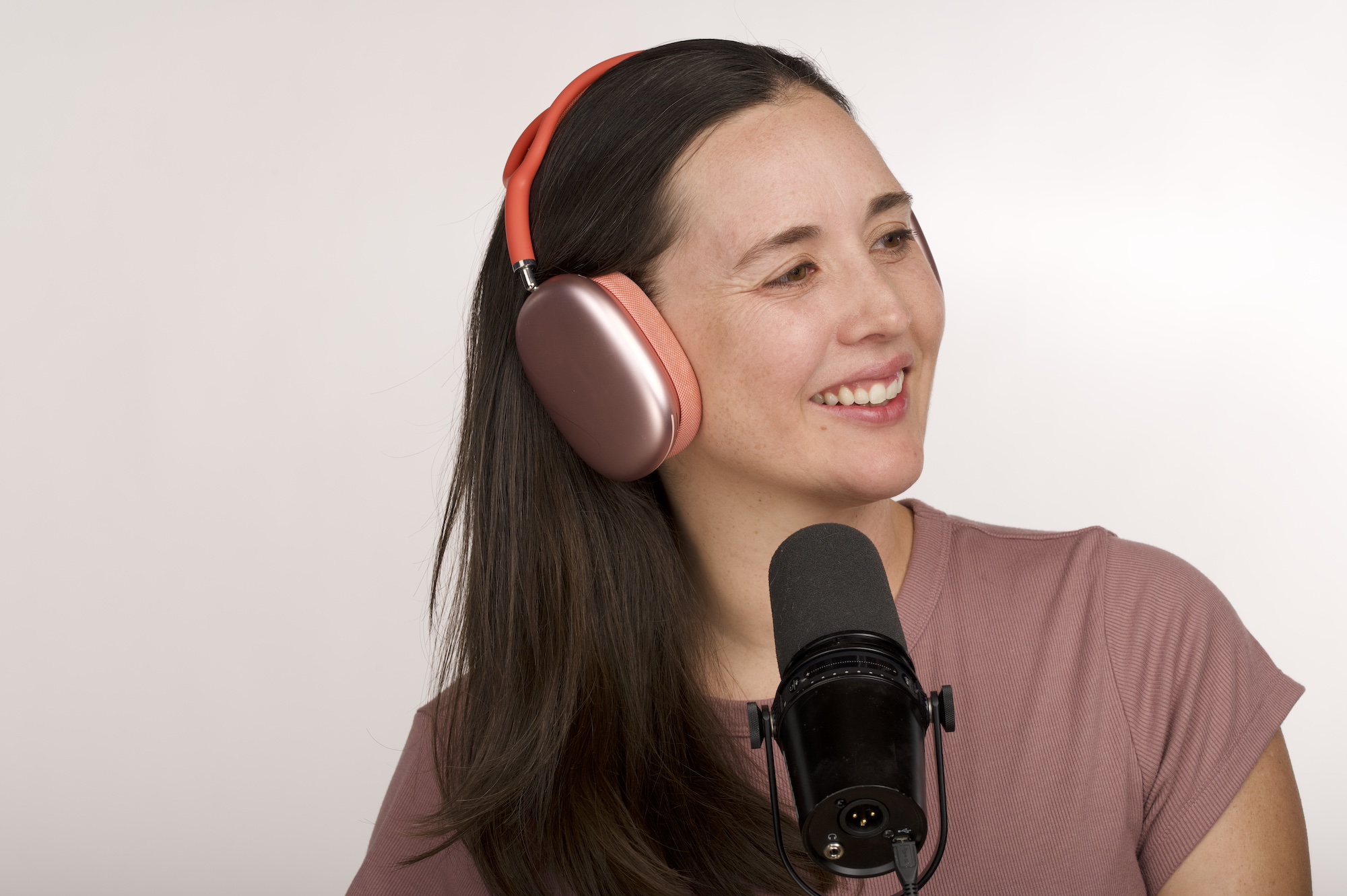 Whitney Lauritsen podcast host producer headphones microphone